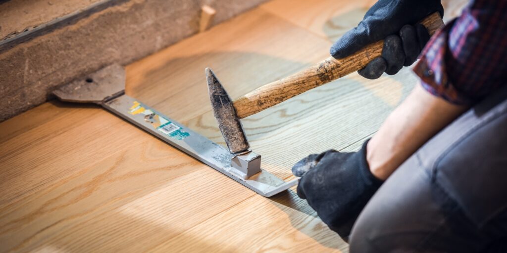 https://www.popularwoodworking.com/review/wp-content/uploads/2023/08/hardwood-floor-repair-popular-woodworking-1024x512.jpg