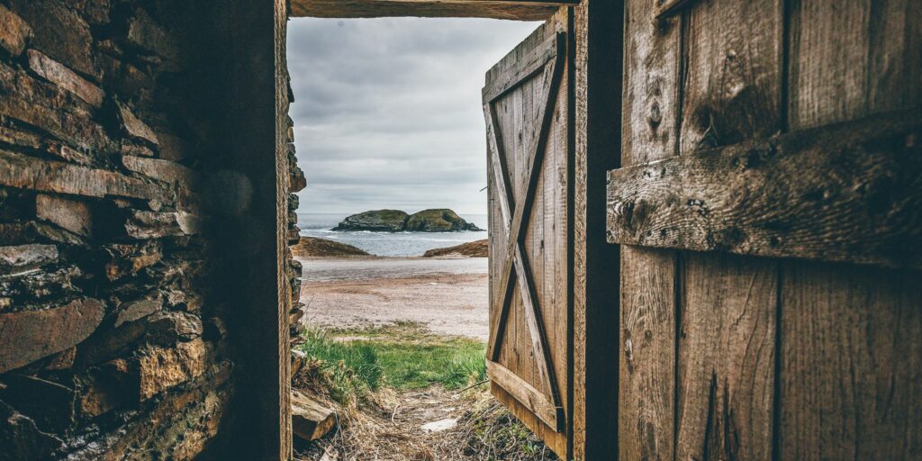 Brown Wooden Opened Door Shed