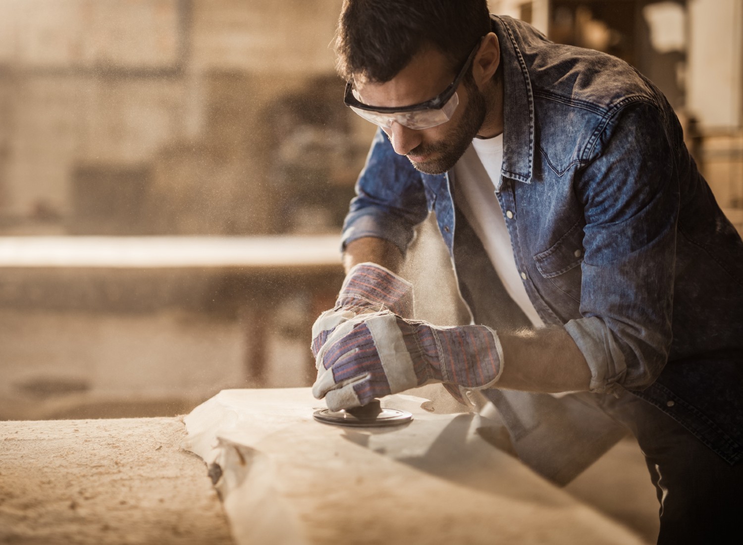 Woodworker wearing safety glasses